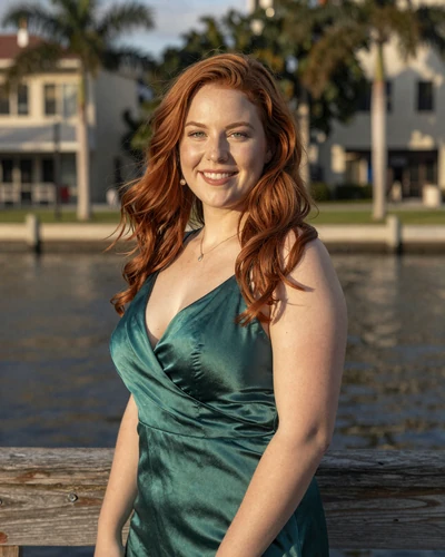 Brielle, verified LuxyMeet Tampa member on Tampa Riverwalk at golden hour